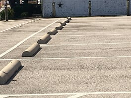 Wheel stops installed in your parking lot in Frisco, Texas
